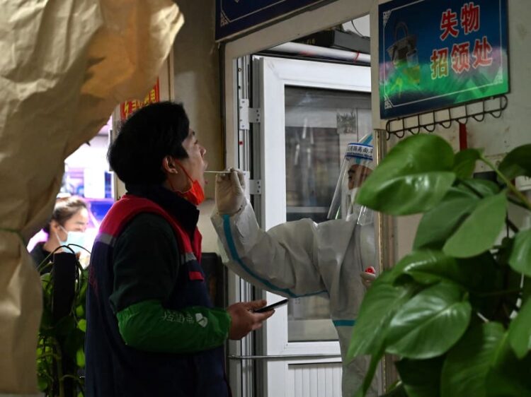 China virus cases at highest level in nearly two years