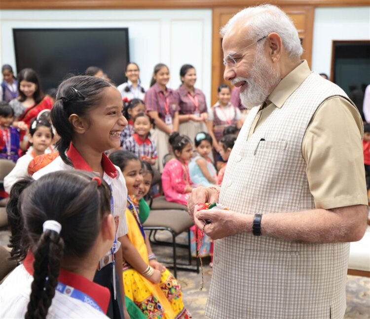PM celebrates Raksha Bandhan with children