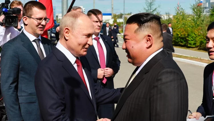 Kim Jong Un and Putin Shake Hands at Russian Spaceport