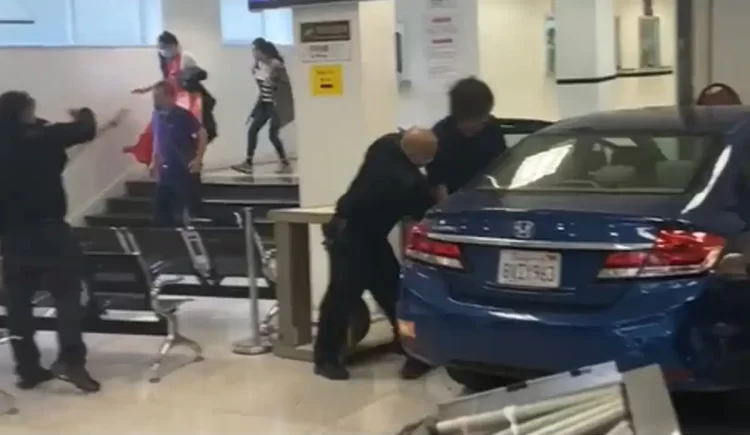 Car Crashes Into Chinese Consulate: Driver Shot Dead