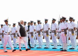 PM inspecting the Guard of Honour at Sindhudurg, in Maharashtra on Navy Day