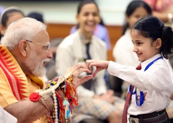 PM Modi Celebrates Raksha Bandhan At 7 LKM; Children & Brahma Kumaris Tie ‘Rakhi’ To Him