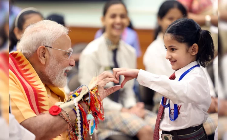 PM Modi Celebrates Raksha Bandhan At 7 LKM; Children & Brahma Kumaris Tie ‘Rakhi’ To Him